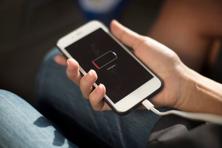 close up hands charging mobile phone 53876 13956