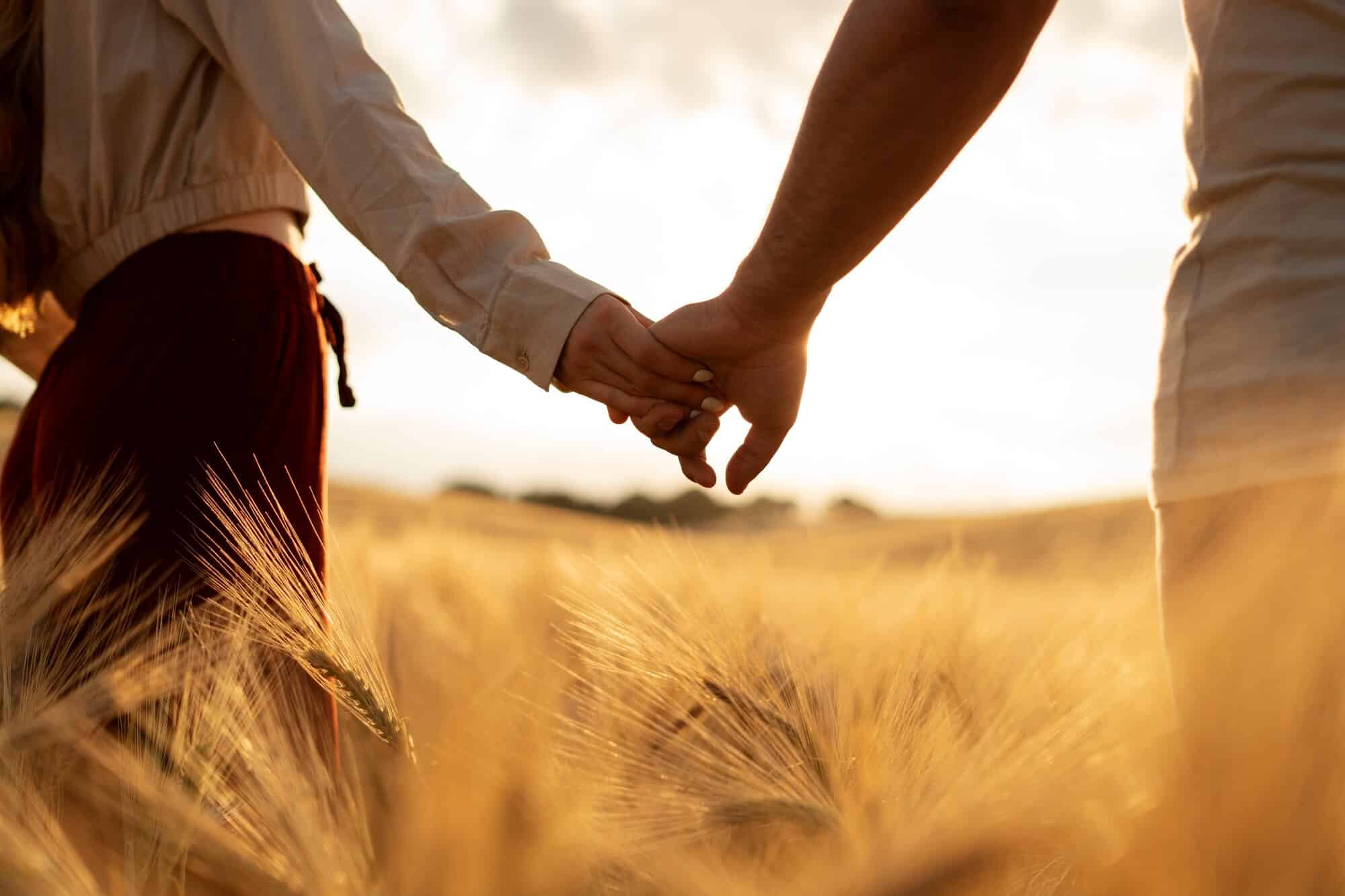 side view partners holding hands 23 2149523772