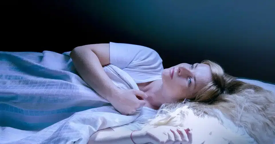 9784 woman waking from nightmare