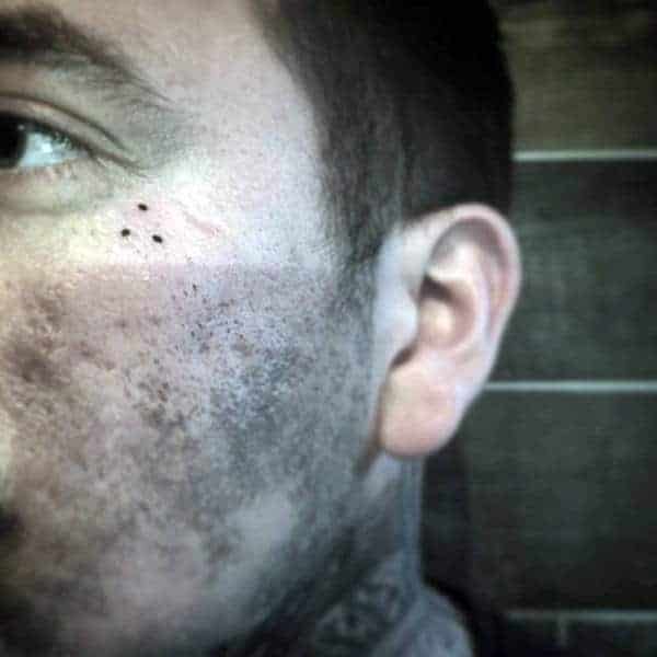 three tiny dots mens face tattoos.0e109306