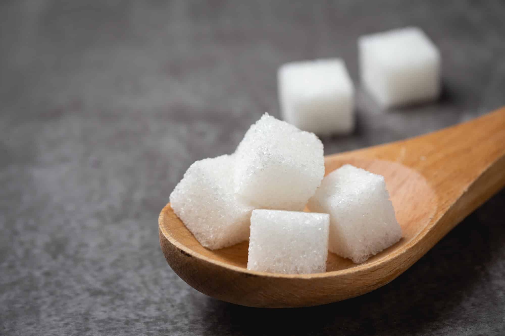 white sugar cube wood spoon table 1150 17021