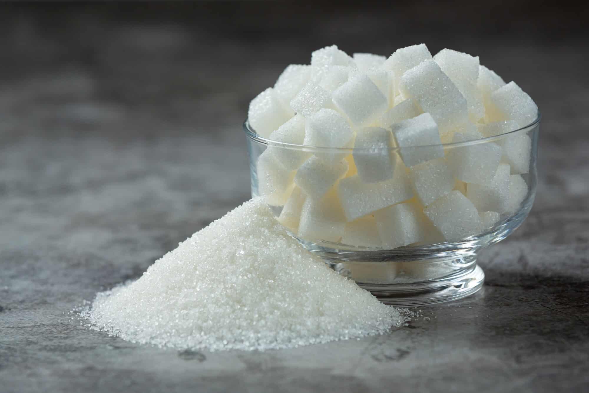 world diabetes day sugar cubes glass bowl dark floor 1150 26665
