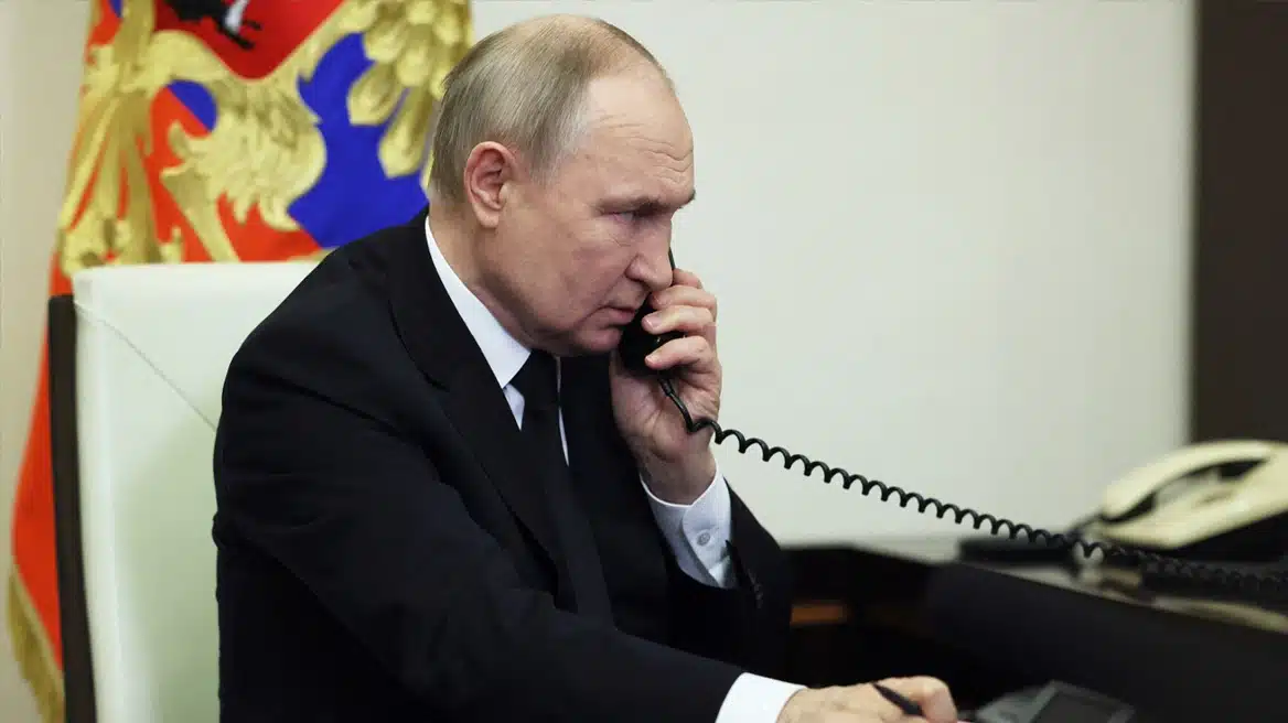 putin with phone afp