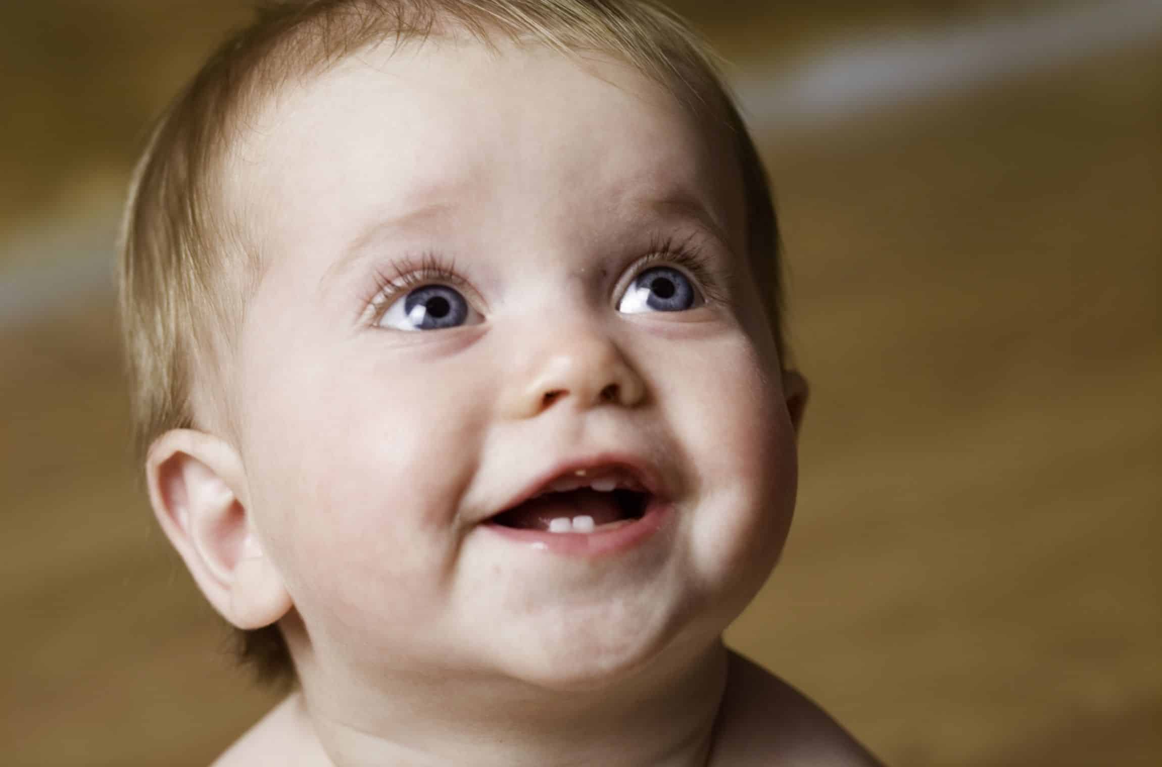130527121229 infant baby teeth smile
