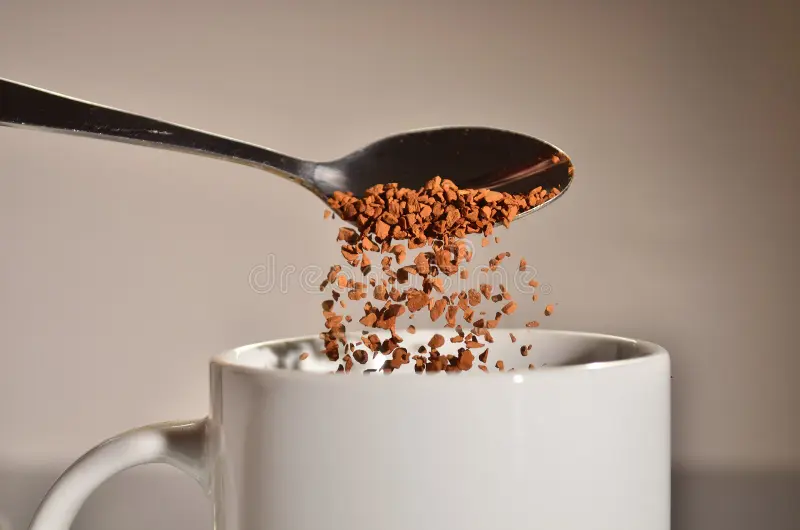 instant coffee pouring teaspoon mug 32221452