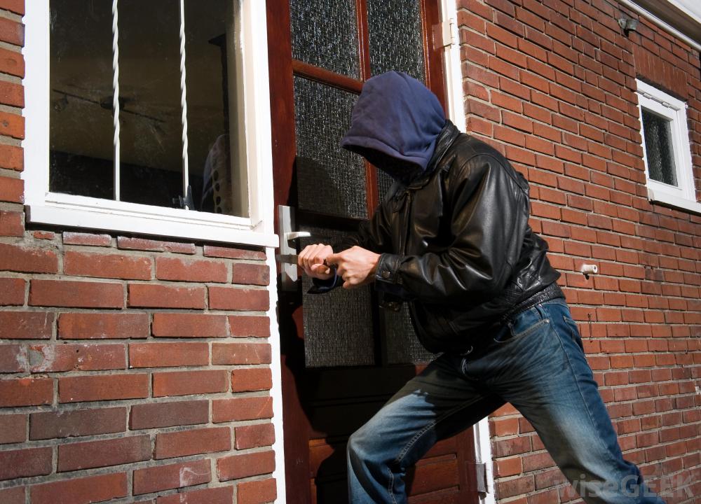 man breaking into home