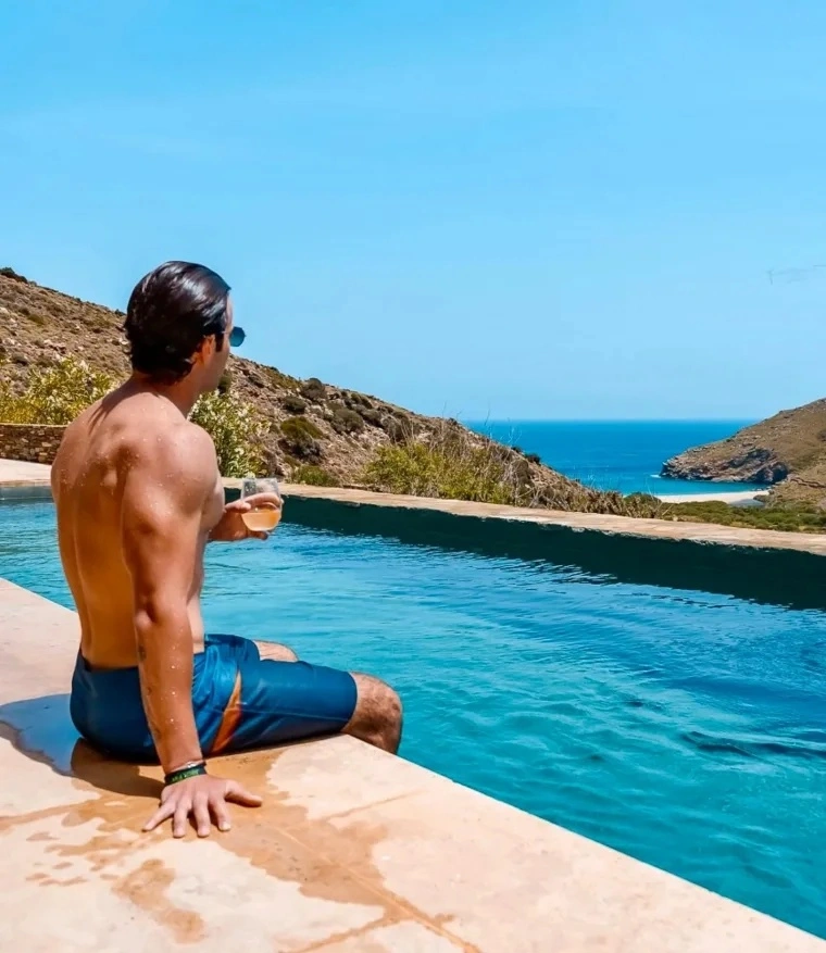 photo shared by aggelos latsios on june 12 2024 tagging onarandros may be an image of 1 person pool santorini and horizon