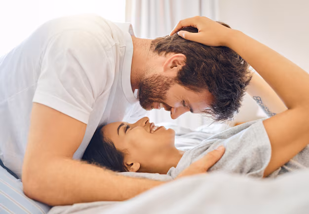 couple love happy with man woman bed bedroom their home together with smile romance dating affection with young male female bonding being intimate house 590464 84540