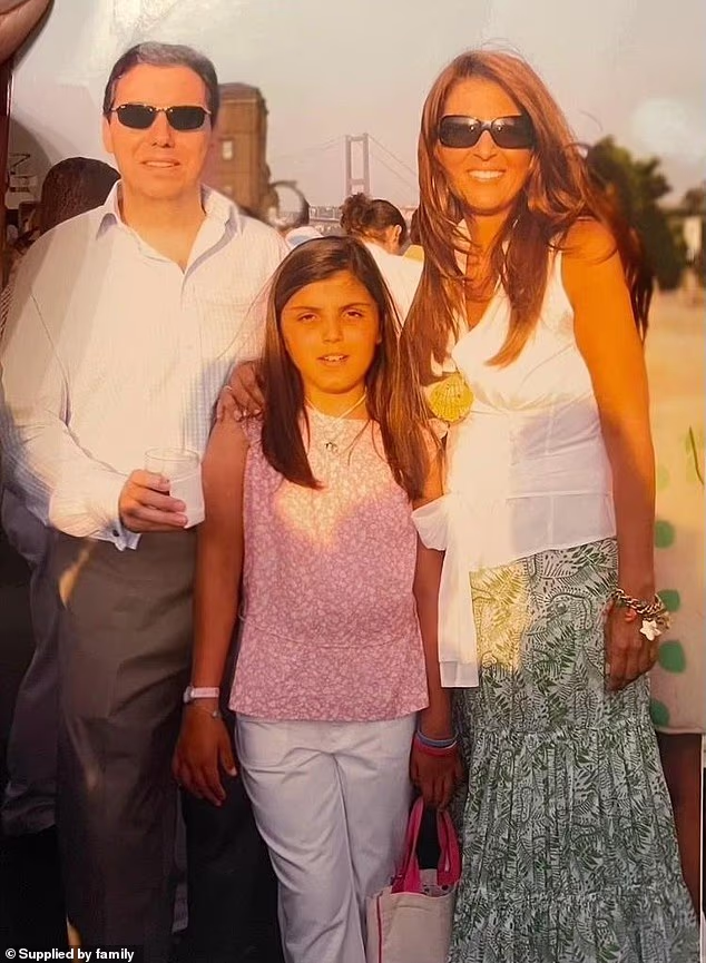 102269227 15129817 marissa is pictured with her mother bessy and her father diamant a 22 1758723684214