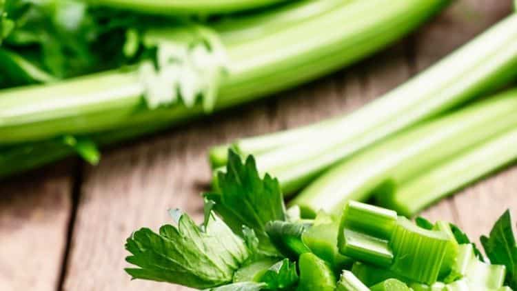 fresh sliced celery in a white bowl picture id623751248
