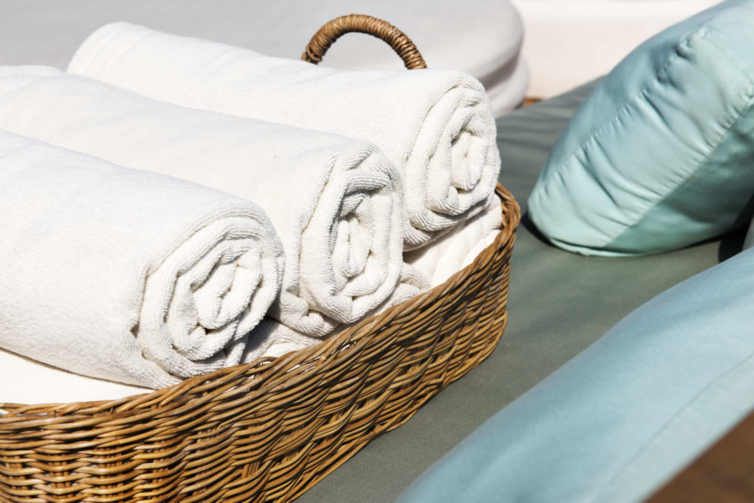 hotel towels rolled wooden basket scaled 1