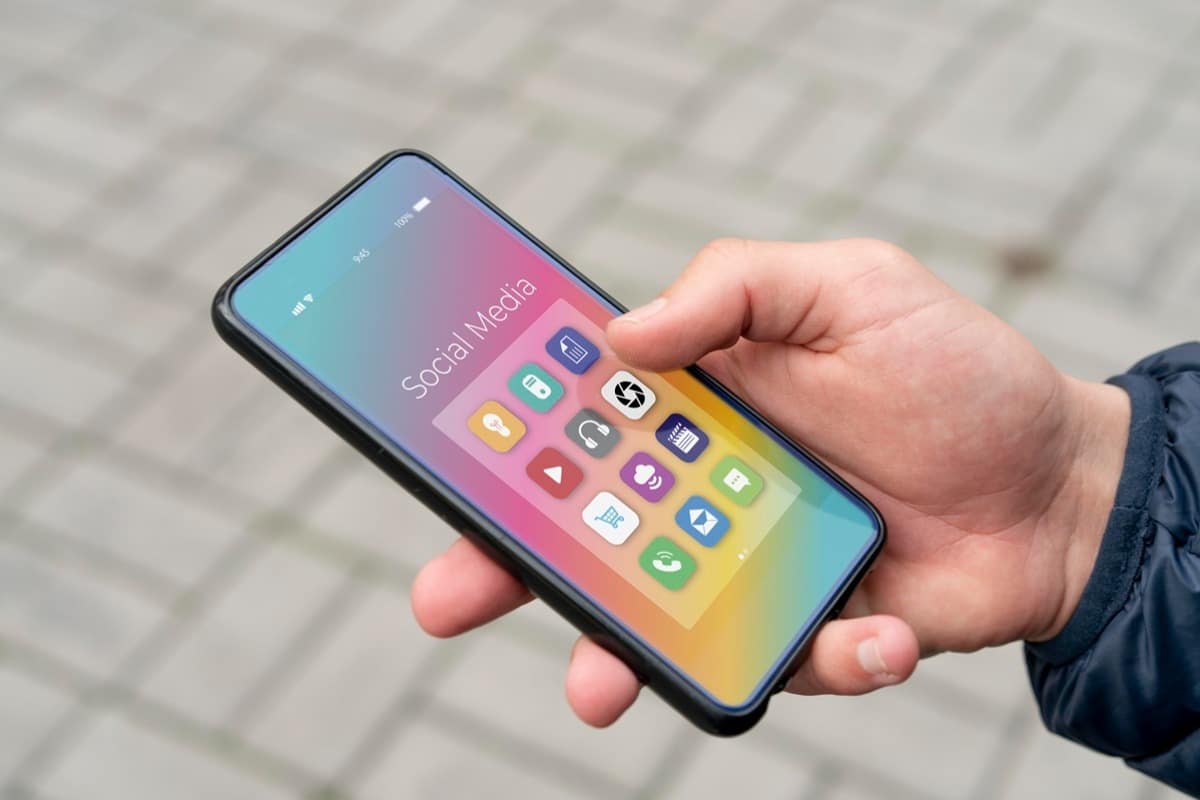 close up hand holding smartphone