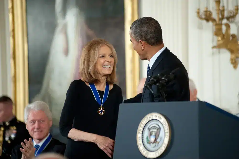 gloria steinem receiving presidential medal of freedom from president barack obama at white house